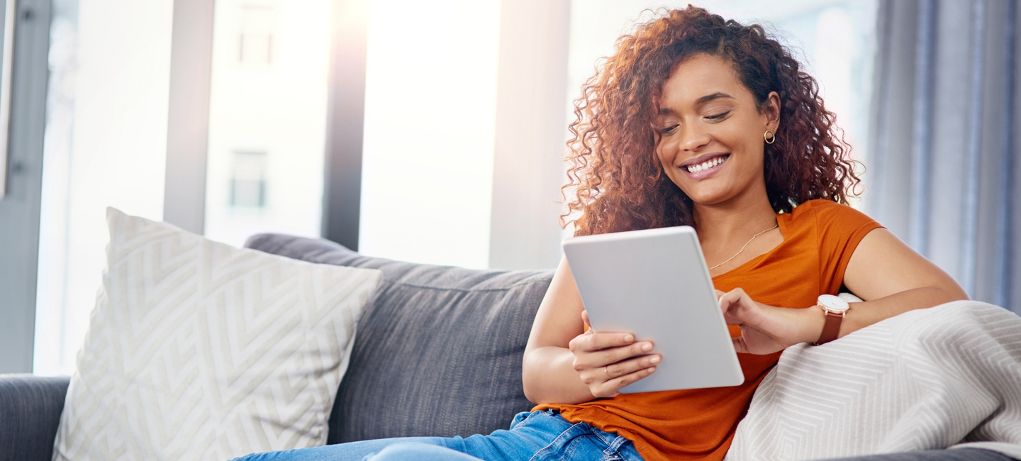 Woman contacting Premier Risk Group on her tablet